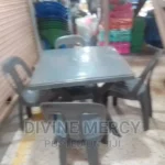aset of plastic table and chairs
