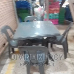 aset of plastic table and chairs