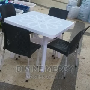 aset of atable and steel legs armless chair