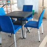 aset of atable and steel armless chair