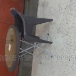 folded steel leg round table and a chair