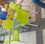 plastic armed chair and atable