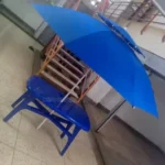 rectangula table and umburella